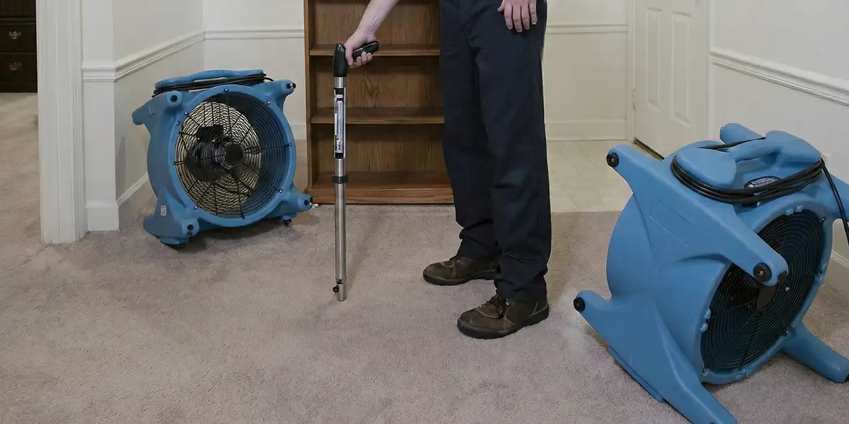 emergency water removal equipment deployed to dry a flooded residential interior in Sarasota, FL